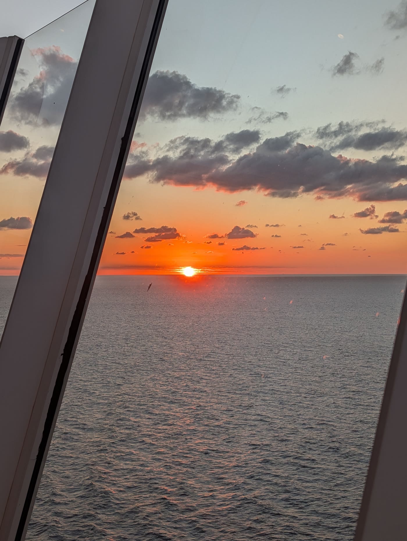 Sunset over the ocean from Harmony of the Seas